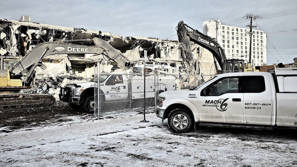 Mach 6 service trucks and equipment on site for a fleet job