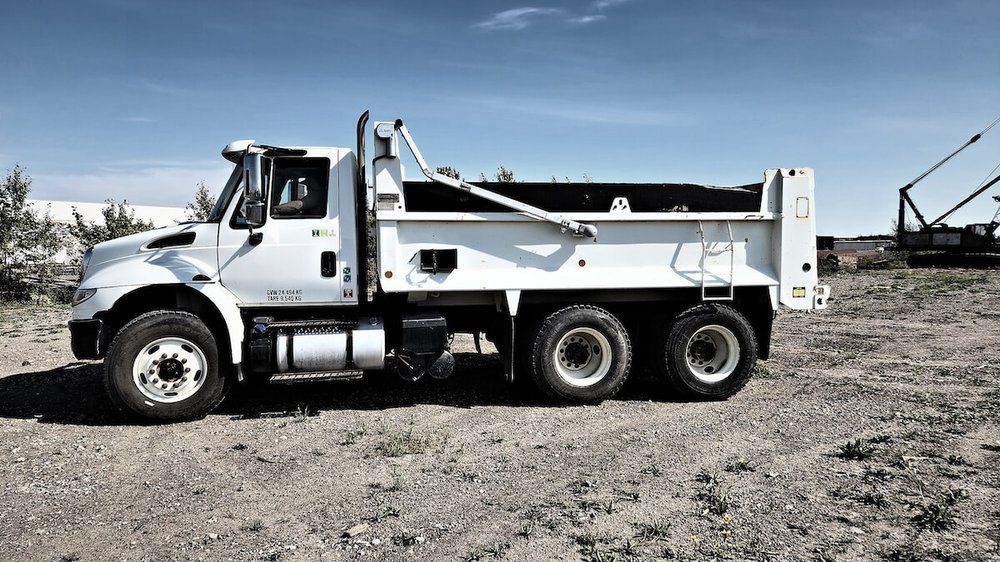 Tandem dump truck, a public-works unit serviced by Mach 6
